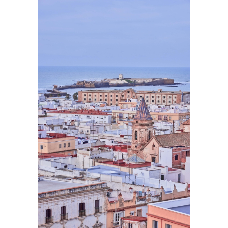 From the vantage point of La Torre Tavira, 'Pastel Panorama of Cadiz' presents a sweeping view of the city's enchanting architecture, steeped in history and tradition.