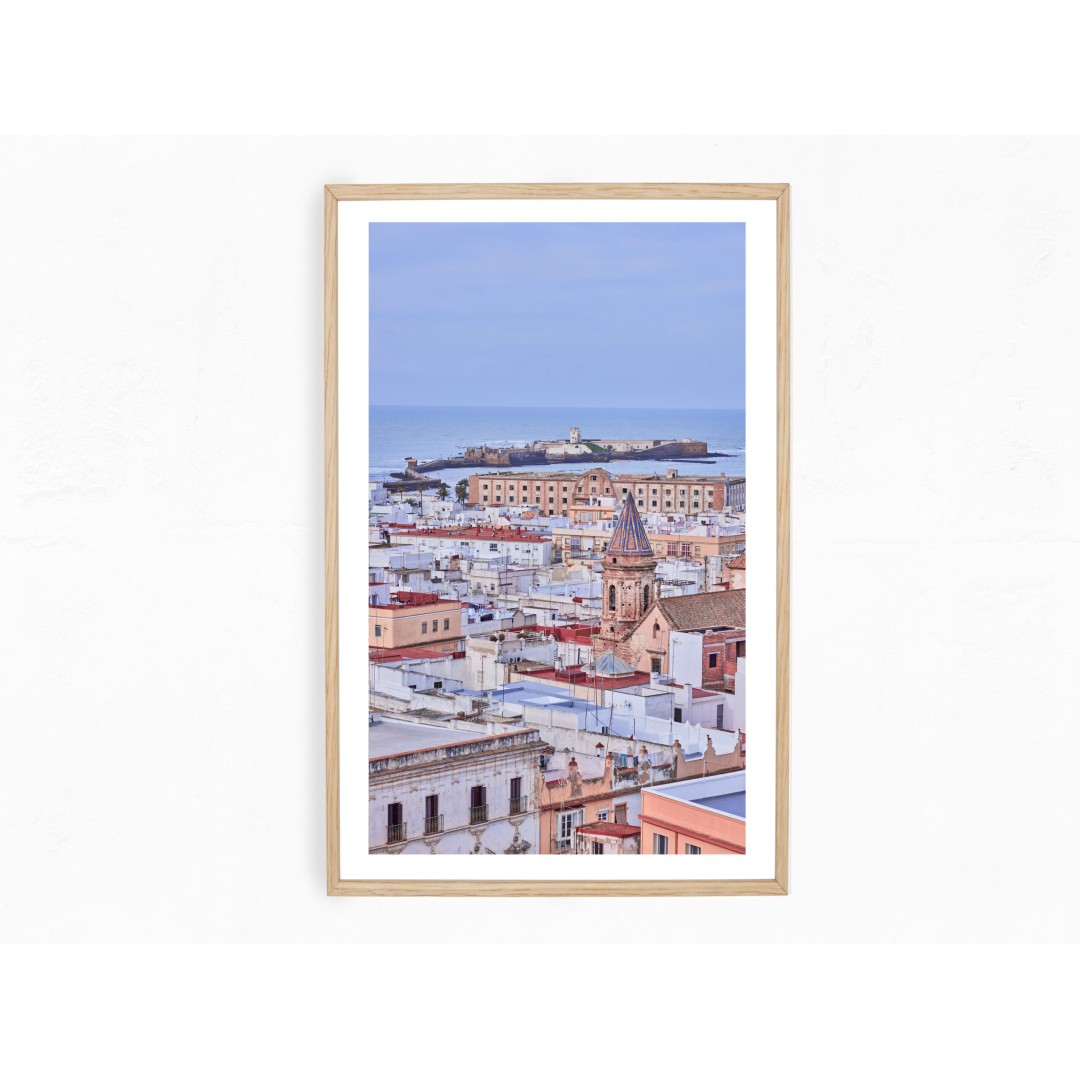 From the vantage point of La Torre Tavira, 'Pastel Panorama of Cadiz' presents a sweeping view of the city's enchanting architecture, steeped in history and tradition.